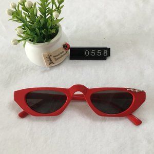 Red frame dark grey lens sunglasses